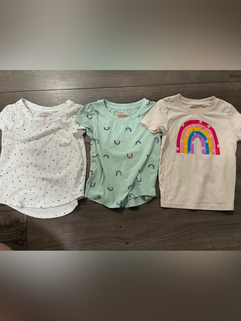 3 girls 2T shirts and 2 pair of skirts
